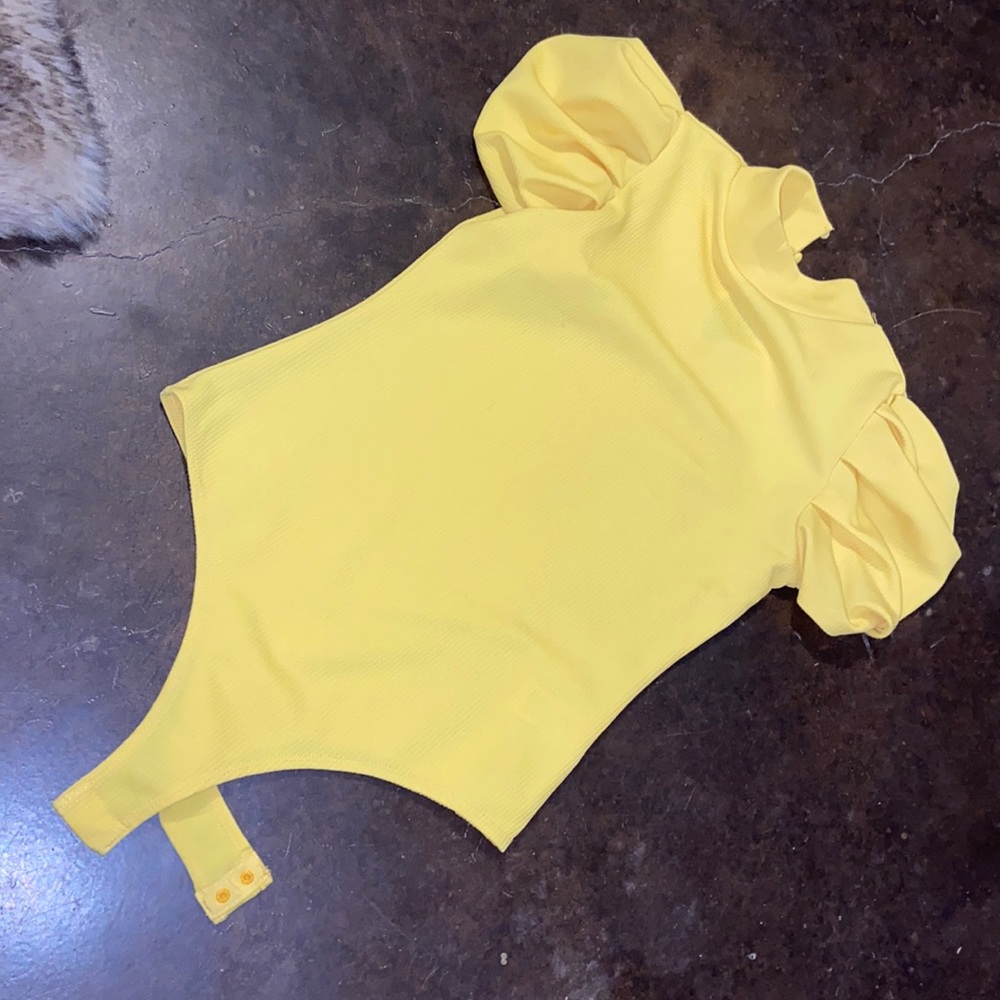 Yellow body suit